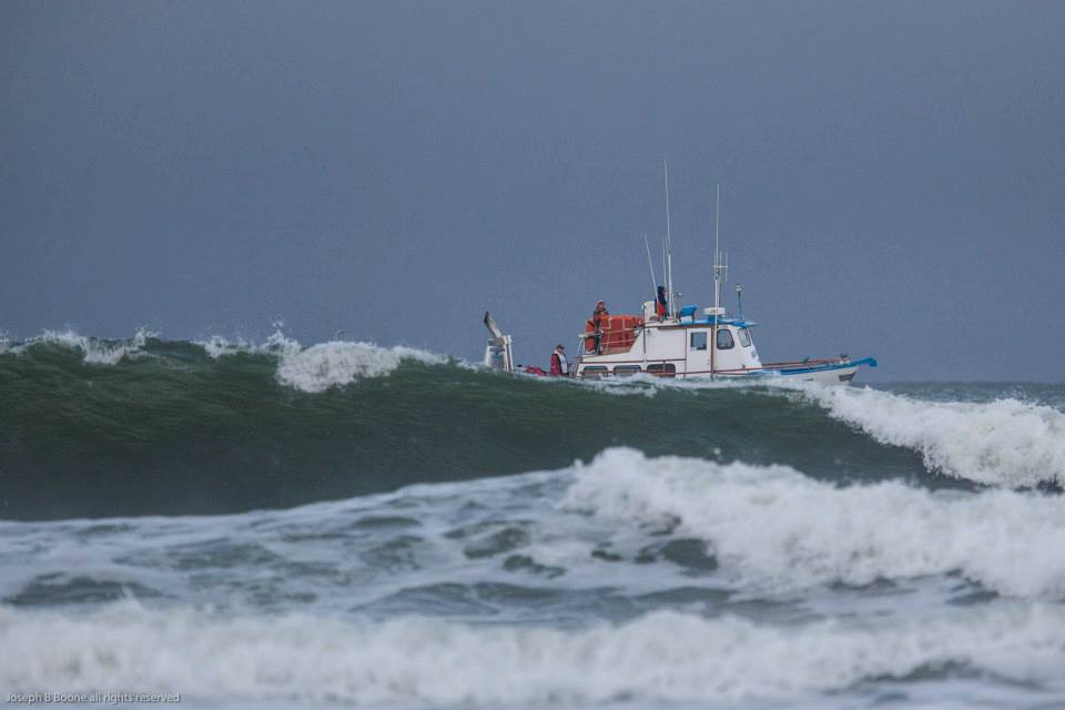 SERC transport boat waits offshore. Photo by Joe Boone